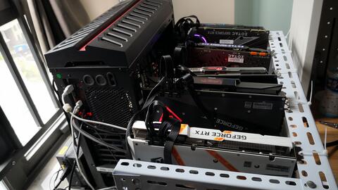 A high-performance GPU mining rig setup in a typical mining farm environment