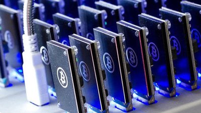 A mining rig consisting of multiple GPUs, highlighting the complexity of hardware configuration.